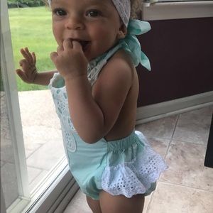 Cute Tiffany blue romper with open back